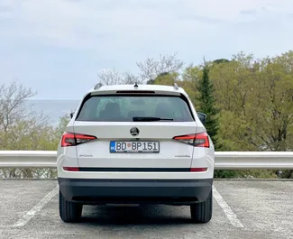 Interni di Skoda Kodiaq in affitto in Montenegro. Un'ottima auto da 7 posti con cambio Automatico.