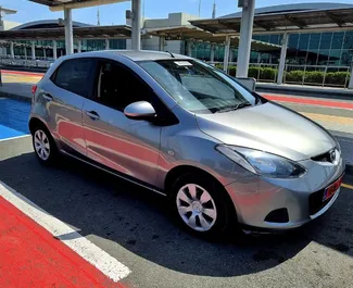 Vista frontale di un noleggio Mazda Demio a Limassol, Cipro ✓ Auto #6675. ✓ Cambio Automatico TM ✓ 1 recensioni.