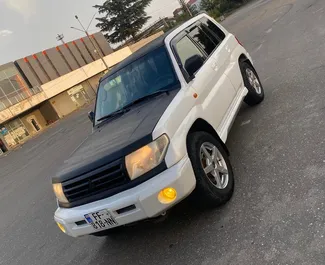 Noleggio auto Mitsubishi Pajero Io 2005 in Georgia, con carburante Benzina e 210 cavalli di potenza ➤ A partire da 90 GEL al giorno.