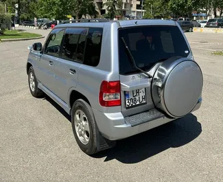 Noleggio Mitsubishi Pajero Io. Auto Economica, Comfort, SUV per il noleggio in Georgia ✓ Cauzione di Senza deposito ✓ Opzioni assicurative RCT, FDW, Furto, All'estero, Senza deposito.