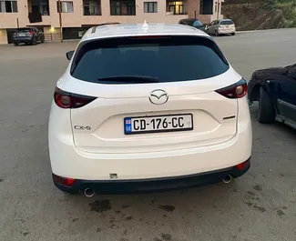 Interni di Mazda CX-5 in affitto in Georgia. Un'ottima auto da 5 posti con cambio Automatico.