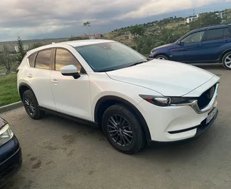 Noleggio Mazda CX-5. Auto Economica, Comfort, Crossover per il noleggio in Georgia ✓ Cauzione di Deposito di 700 GEL ✓ Opzioni assicurative RCT, CDW, Passeggeri, Furto.