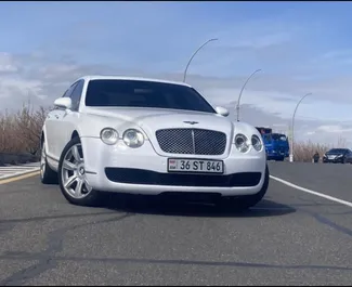 Vista frontale di un noleggio Bentley Flying Spur a Yerevan, Armenia ✓ Auto #6771. ✓ Cambio Automatico TM ✓ 0 recensioni.