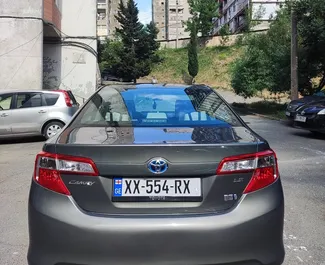 Noleggio auto Toyota Camry 2014 in Georgia, con carburante Ibrido e 160 cavalli di potenza ➤ A partire da 102 GEL al giorno.