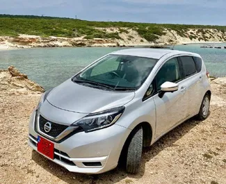 Noleggio auto Nissan Note Medalist 2018 a Cipro, con carburante Benzina e 90 cavalli di potenza ➤ A partire da 25 EUR al giorno.