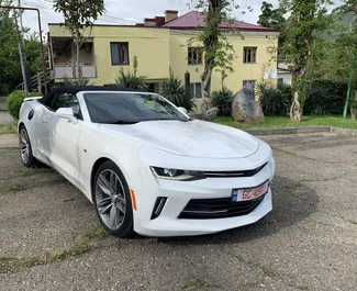 Noleggio auto Chevrolet Camaro Cabrio 2016 in Georgia, con carburante Benzina e 335 cavalli di potenza ➤ A partire da 200 GEL al giorno.