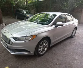 Noleggio auto Ford Fusion Sedan 2017 in Georgia, con carburante Ibrido e 188 cavalli di potenza ➤ A partire da 128 GEL al giorno.