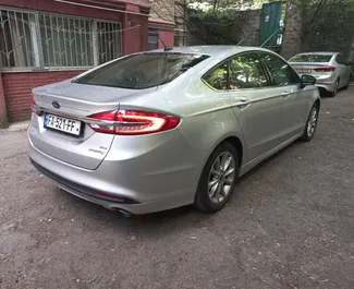 Noleggio Ford Fusion Sedan. Auto Comfort, Premium per il noleggio in Georgia ✓ Cauzione di Deposito di 500 GEL ✓ Opzioni assicurative RCT, SCDW, Furto.