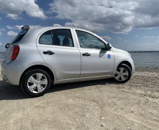 Nissan March 2018 disponibile per il noleggio a Larnaca, con limite di chilometraggio di illimitato.