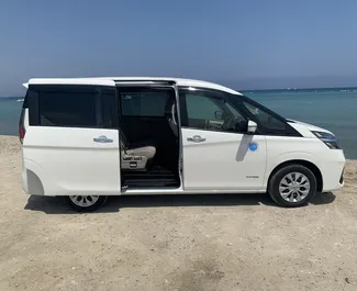 Noleggio auto Nissan Serena 2020 a Cipro, con carburante Ibrido e 178 cavalli di potenza ➤ A partire da 40 EUR al giorno.