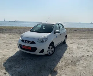 Vista frontale di un noleggio Nissan March a Larnaca, Cipro ✓ Auto #7156. ✓ Cambio Automatico TM ✓ 0 recensioni.