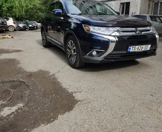 Vista frontale di un noleggio Mitsubishi Outlander Xl a Tbilisi, Georgia ✓ Auto #7325. ✓ Cambio Automatico TM ✓ 1 recensioni.