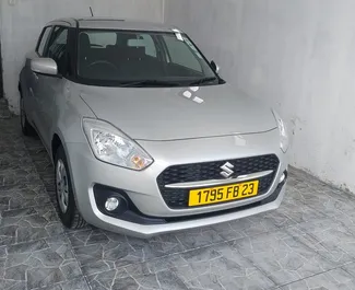 Vista frontale di un noleggio Suzuki Swift a Mauritius, Mauritius ✓ Auto #7423. ✓ Cambio Automatico TM ✓ 0 recensioni.