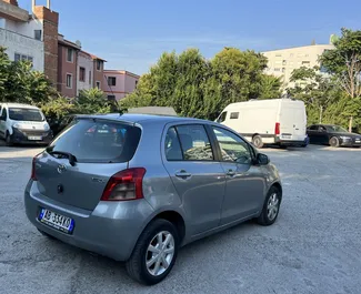 Noleggio Toyota Yaris. Auto Economica, Comfort per il noleggio in Albania ✓ Cauzione di Senza deposito ✓ Opzioni assicurative RCT, CDW, All'estero.