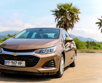 Noleggio Chevrolet Cruze. Auto Comfort per il noleggio in Georgia ✓ Cauzione di Deposito di 250 GEL ✓ Opzioni assicurative RCT, CDW, SCDW, FDW, Passeggeri, Furto.