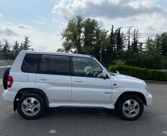 Noleggio auto Mitsubishi Pajero Io #7774 Automatico a Kutaisi, dotata di motore 2,0L ➤ Da Dima in Georgia.