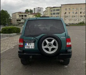 Noleggio auto Mitsubishi Pajero Io #7748 Automatico a Kutaisi, dotata di motore 1,8L ➤ Da Dima in Georgia.