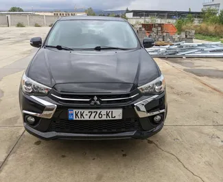 Vista frontale di un noleggio Mitsubishi Outlander Sport a Tbilisi, Georgia ✓ Auto #7905. ✓ Cambio Automatico TM ✓ 0 recensioni.