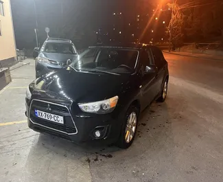 Vista frontale di un noleggio Mitsubishi Outlander Sport a Tbilisi, Georgia ✓ Auto #7871. ✓ Cambio Automatico TM ✓ 1 recensioni.