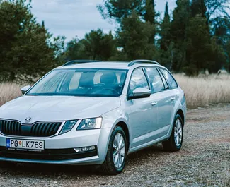 Vista frontale di un noleggio Skoda Octavia Combi a Podgorica, Montenegro ✓ Auto #7360. ✓ Cambio Automatico TM ✓ 0 recensioni.