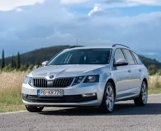 Vista frontale di un noleggio Skoda Octavia Combi a Podgorica, Montenegro ✓ Auto #4707. ✓ Cambio Automatico TM ✓ 5 recensioni.