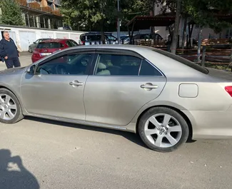 Noleggio Toyota Camry. Auto Comfort, Premium per il noleggio in Georgia ✓ Cauzione di Senza deposito ✓ Opzioni assicurative RCT.