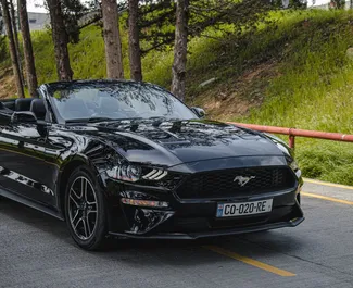 Noleggio auto Ford Mustang Cabrio 2018 in Georgia, con carburante Benzina e 310 cavalli di potenza ➤ A partire da 233 GEL al giorno.