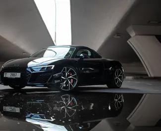 Vista frontale di un noleggio Audi R8 Cabrio a Dubai, Emirati Arabi Uniti ✓ Auto #8420. ✓ Cambio Automatico TM ✓ 0 recensioni.