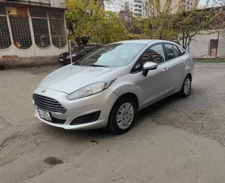 Vista frontale di un noleggio Ford Fiesta a Yerevan, Armenia ✓ Auto #6782. ✓ Cambio Automatico TM ✓ 0 recensioni.