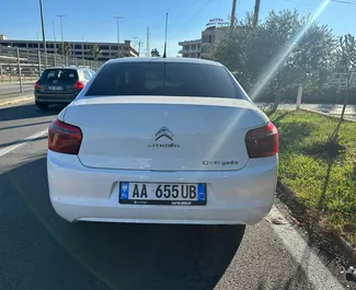 Noleggio Citroen C-Elysee. Auto Economica, Comfort per il noleggio in Albania ✓ Cauzione di Deposito di 150 EUR ✓ Opzioni assicurative RCT, CDW, All'estero.