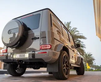 Vista frontale di un noleggio Mercedes-Benz G63 AMG a Dubai, Emirati Arabi Uniti ✓ Auto #8400. ✓ Cambio Automatico TM ✓ 0 recensioni.