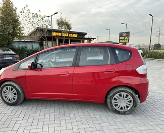 Noleggio Honda Jazz. Auto Economica, Comfort per il noleggio in Albania ✓ Cauzione di Deposito di 100 EUR ✓ Opzioni assicurative RCT, FDW.