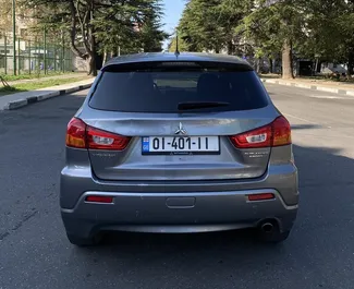 Interni di Mitsubishi Outlander Sport in affitto in Georgia. Un'ottima auto da 5 posti con cambio Automatico.