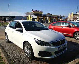 Vista frontale di un noleggio Peugeot 308 a Podgorica, Montenegro ✓ Auto #8792. ✓ Cambio Manuale TM ✓ 0 recensioni.