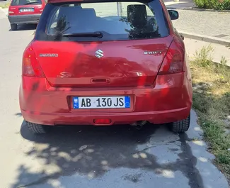 Noleggio Suzuki Swift. Auto Economica per il noleggio in Albania ✓ Cauzione di Deposito di 100 EUR ✓ Opzioni assicurative RCT, All'estero.