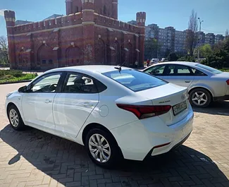 Noleggio Hyundai Solaris. Auto Economica, Comfort per il noleggio in Russia ✓ Cauzione di Deposito di 5000 RUB ✓ Opzioni assicurative RCT.