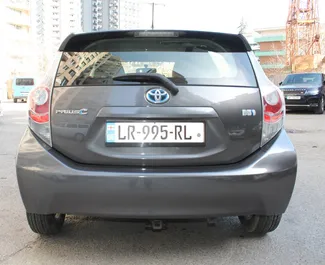 Noleggio auto Toyota Prius C 2012 in Georgia, con carburante Ibrido e 99 cavalli di potenza ➤ A partire da 75 GEL al giorno.