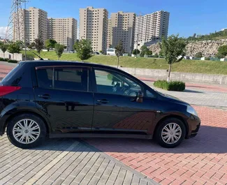 Nissan Tiida 2007 disponibile per il noleggio a Yerevan, con limite di chilometraggio di illimitato.