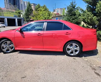 Noleggio auto Toyota Camry 2014 in Georgia, con carburante Benzina e 268 cavalli di potenza ➤ A partire da 126 GEL al giorno.