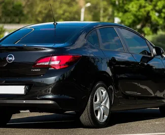 Noleggio auto Opel Astra Sedan 2014 in Armenia, con carburante Benzina e 140 cavalli di potenza ➤ A partire da 30 USD al giorno.