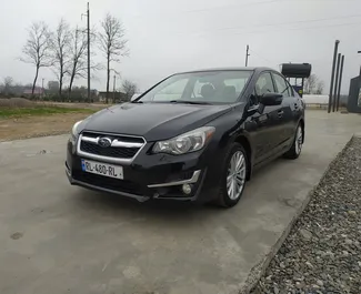 Vista frontale di un noleggio Subaru Impreza all'aeroporto di Kutaisi, Georgia ✓ Auto #9231. ✓ Cambio Automatico TM ✓ 0 recensioni.