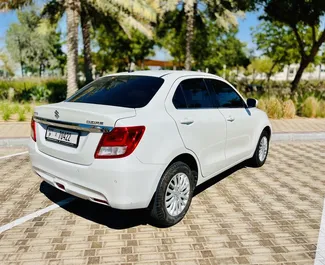 Noleggio auto Suzuki Dzire #9131 Automatico all'aeroporto di Dubai Al Maktoum, dotata di motore 1,5L ➤ Da Mikael negli Emirati Arabi Uniti.