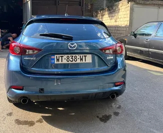 Noleggio Mazda 3. Auto Economica, Comfort per il noleggio in Georgia ✓ Cauzione di Deposito di 200 GEL ✓ Opzioni assicurative RCT.