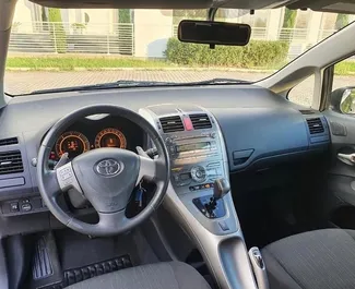 Noleggio Toyota Auris. Auto Economica, Comfort per il noleggio in Albania ✓ Cauzione di Deposito di 200 EUR ✓ Opzioni assicurative RCT, CDW, SCDW, All'estero, Giovane.