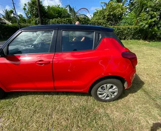 Vista frontale di un noleggio Suzuki Swift a Mauritius, Mauritius ✓ Auto #9420. ✓ Cambio Automatico TM ✓ 0 recensioni.