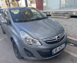 Vista frontale di un noleggio Opel Corsa all'aeroporto di Tirana, Albania ✓ Auto #9416. ✓ Cambio Manuale TM ✓ 0 recensioni.