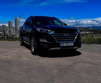 Vista frontale di un noleggio Hyundai Tucson a Tbilisi, Georgia ✓ Auto #9591. ✓ Cambio Automatico TM ✓ 0 recensioni.