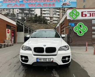 Vista frontale di un noleggio BMW X6 a Tbilisi, Georgia ✓ Auto #9660. ✓ Cambio Automatico TM ✓ 0 recensioni.