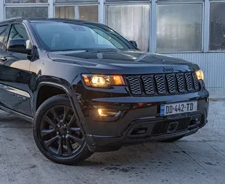 Jeep Grand Cherokee 2021 disponibile per il noleggio a Tbilisi, con limite di chilometraggio di illimitato.