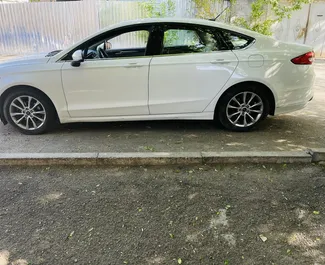 Noleggio auto Ford Fusion Sedan 2016 in Georgia, con carburante Benzina e 60 cavalli di potenza ➤ A partire da 162 GEL al giorno.